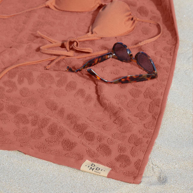 Strand, sportschool of badkamer; Dindi badgoed past overal